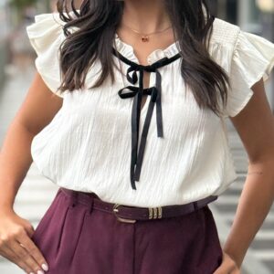 Blusa cuella bandeja sin mangas con lazo